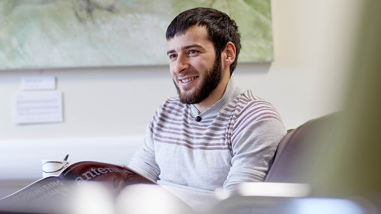 A student in the postgraduate centre