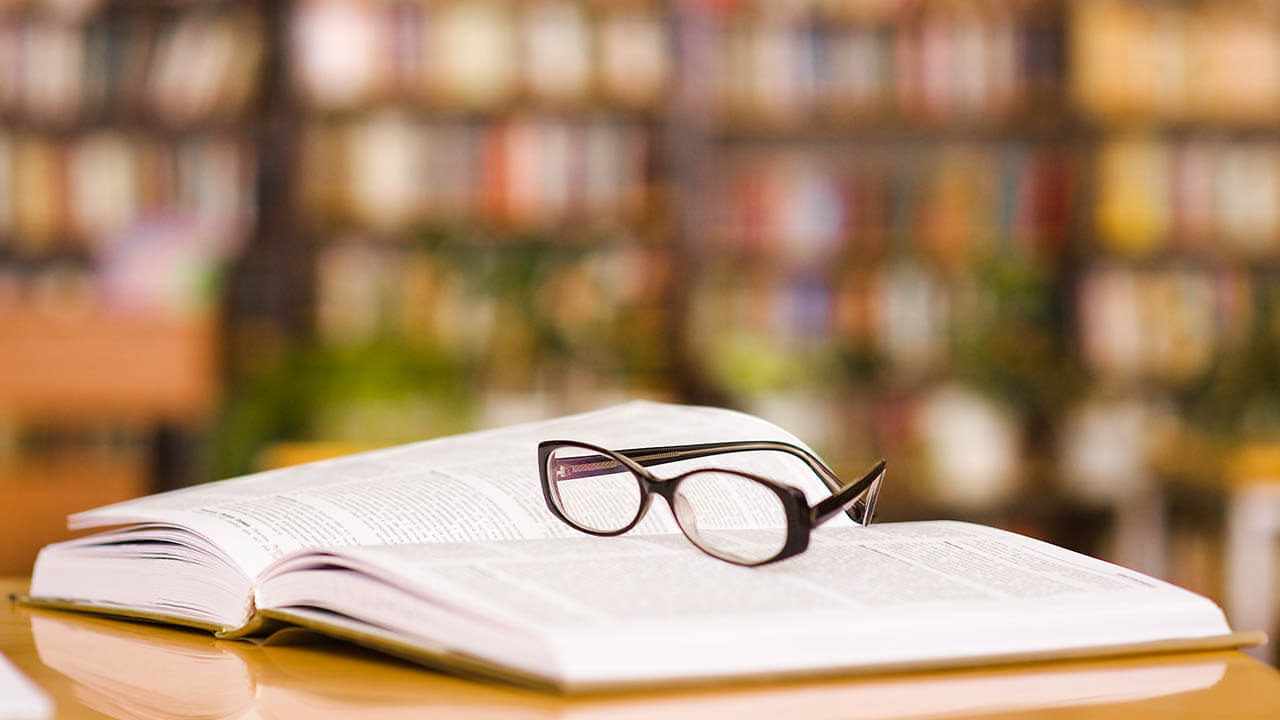 An open book in a library