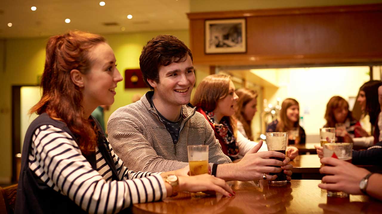 Students having a drink and chat in the Welly Inn